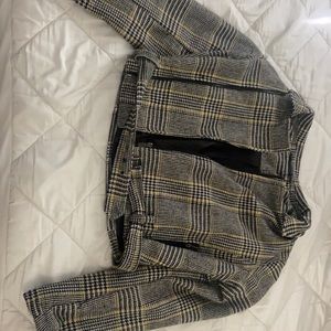 Never use it!  Size M plaid coat waist level.